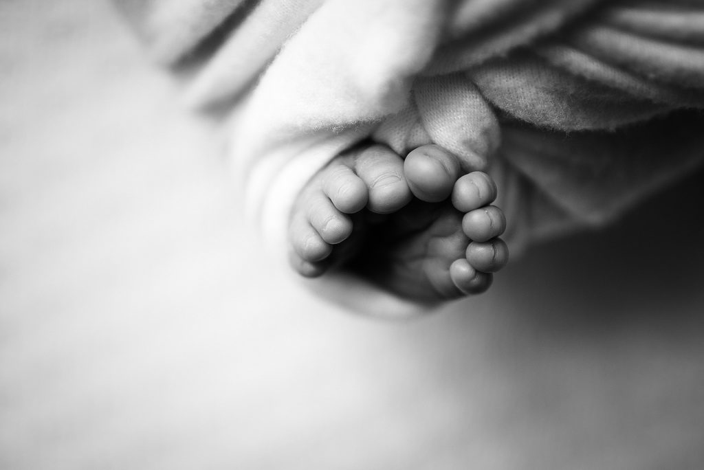 Baby toes close up black and white photo in Jacksonville, FL